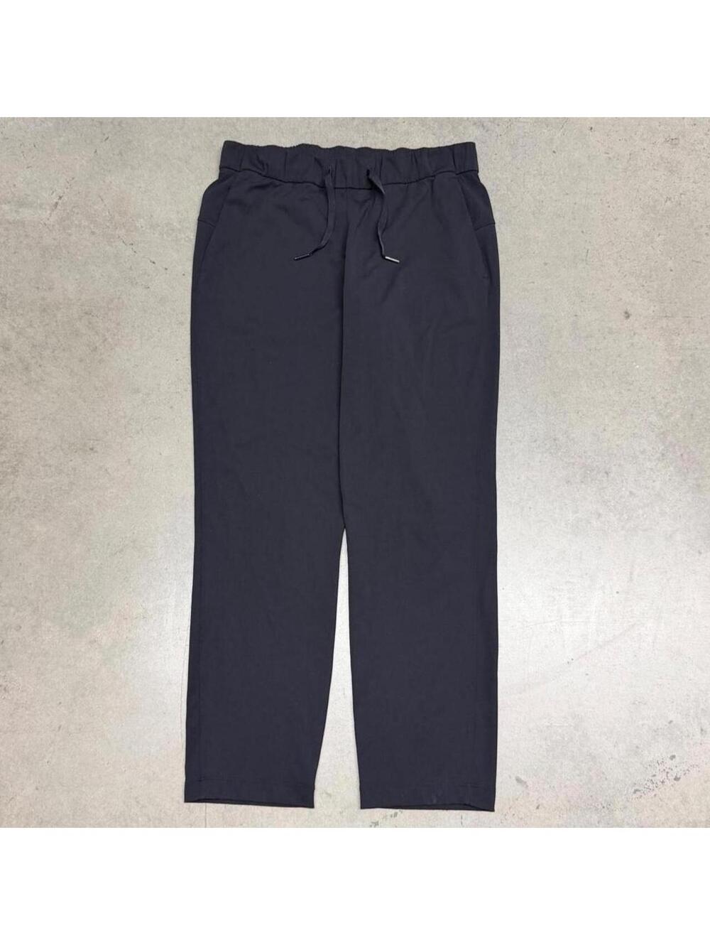 Lululemon On the Fly Pants 7/8 Woven Drawstring Pockets Stretch Black Size 8